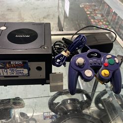 Game cube game system with memory card pick up only 