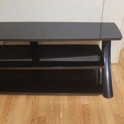 BLACK GLASS HEAVY DUTY TV STAND  HOLDS  82 INCH 