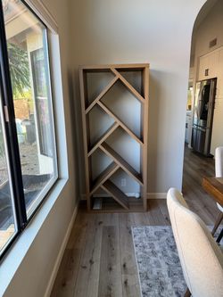 2 unique wooden bookshelves