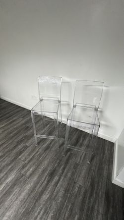 3 acrylic chairs