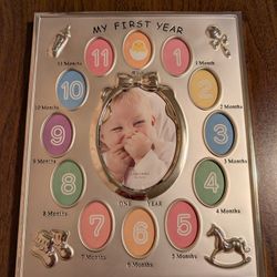 New in box , baby first year photo frame 