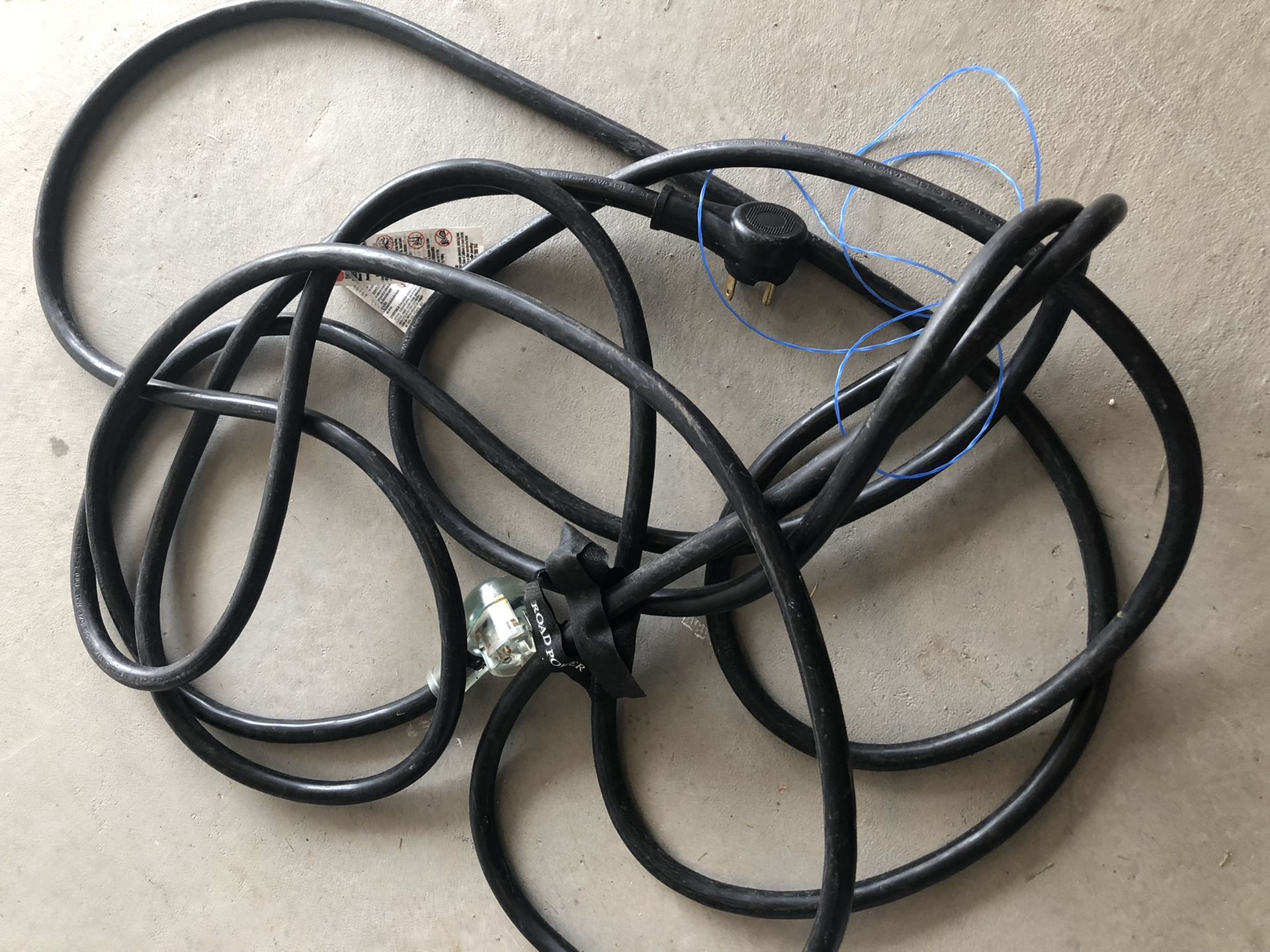 RV 30 amp extension cord and hose.