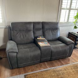 Motorized Reclining Chair And Loveseat With Cupholders Many Different Positions, from Living Spaces New One Year Ago