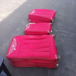 Three Red Suit Cases Good Shape