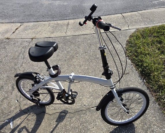 Bicycle folding Sunrun with new lock and phone holder.