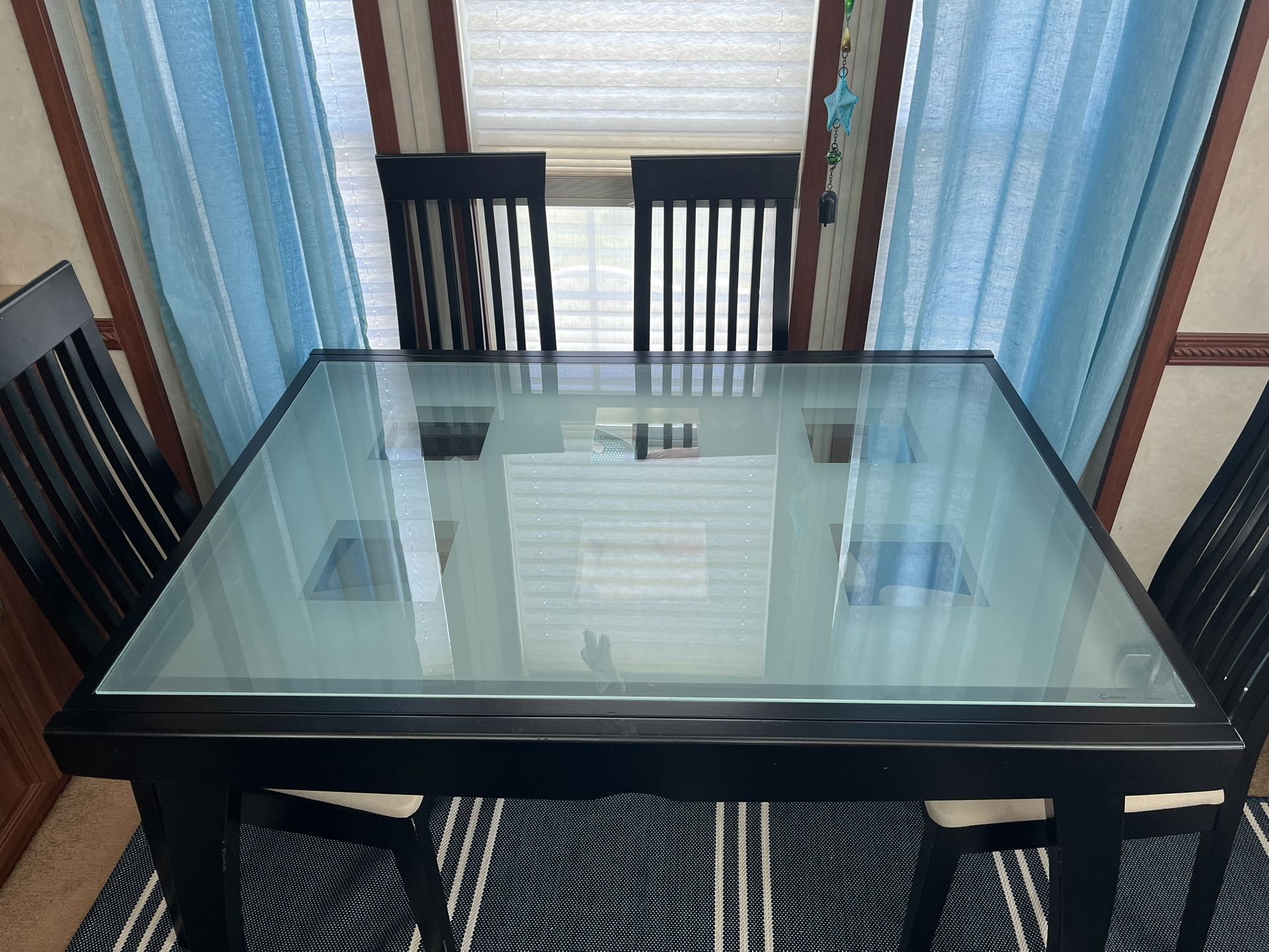 Italian Tempted Glass Dining Table With 4 Chairs
