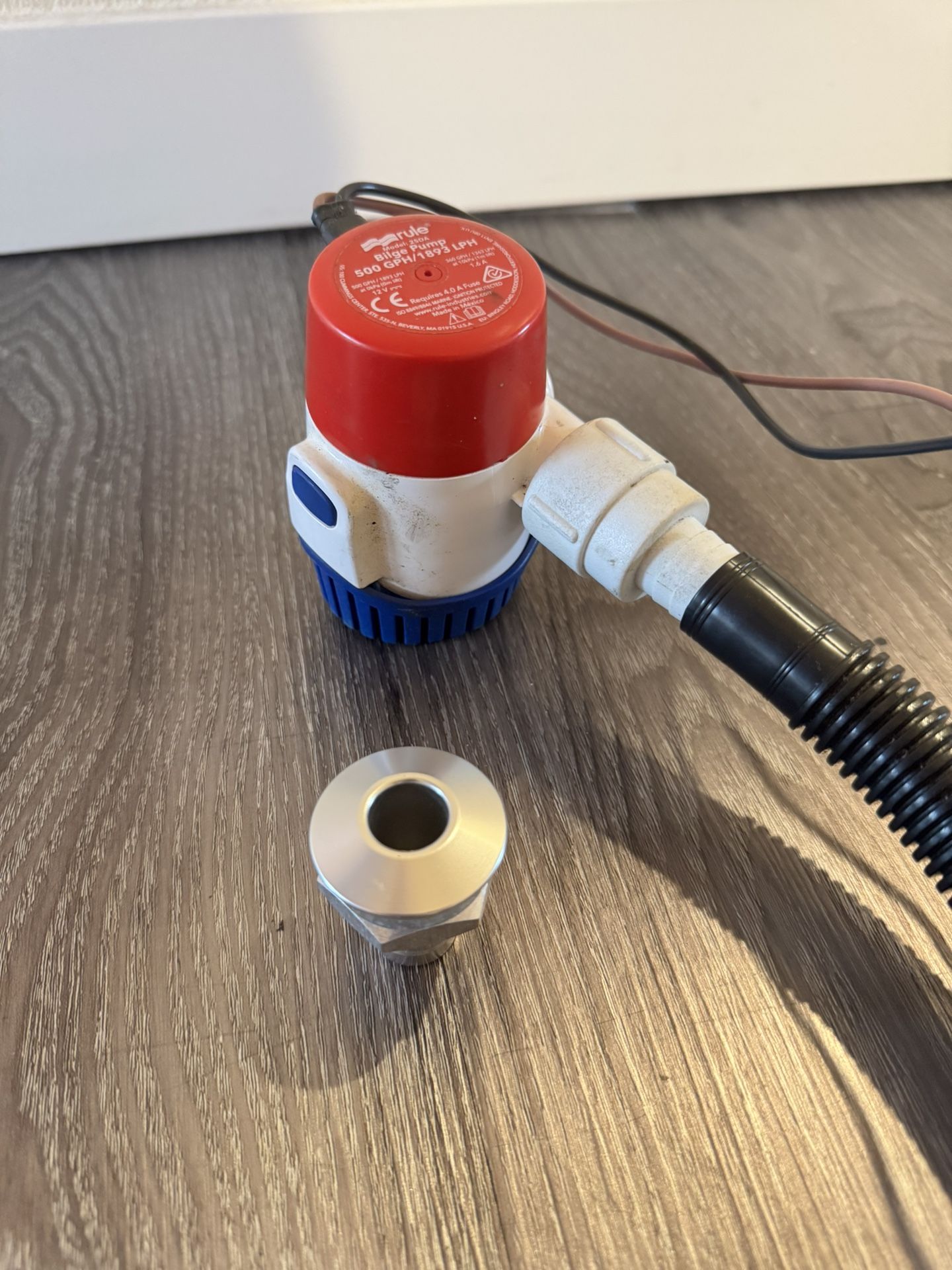 Rule bilge pump and livewell fitting