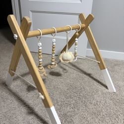 Wooden baby play gym