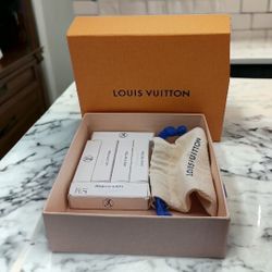 Louis Vuitton box, contains 1 dust bag, and 6 - .067 fl.oz. perfumes, Turbulence, Mille Feux, Apogee, 2- Dan's LA Peau, and Attrape-Reves. one of the 