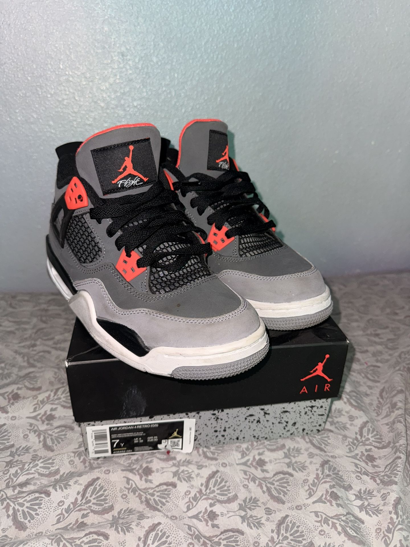 Jordan 4 “grey and orange”
