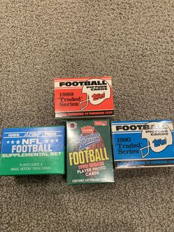 4 football sets. Troy Aikman, Emmitt Smith, Barry Sanders and Deion Sanders Rookies!
