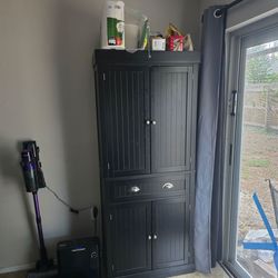 Black pantry cabinet