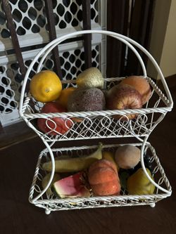 Metal basket with fruit