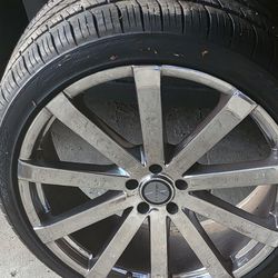 Two Different Sets Of 22inch Rims With Tires 