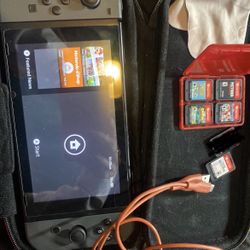 Nintendo Switch + 5 Games And Accessories 