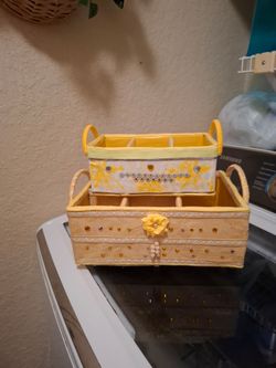 2 decorated boxes