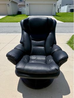 Selling a swivel leather armchair.
