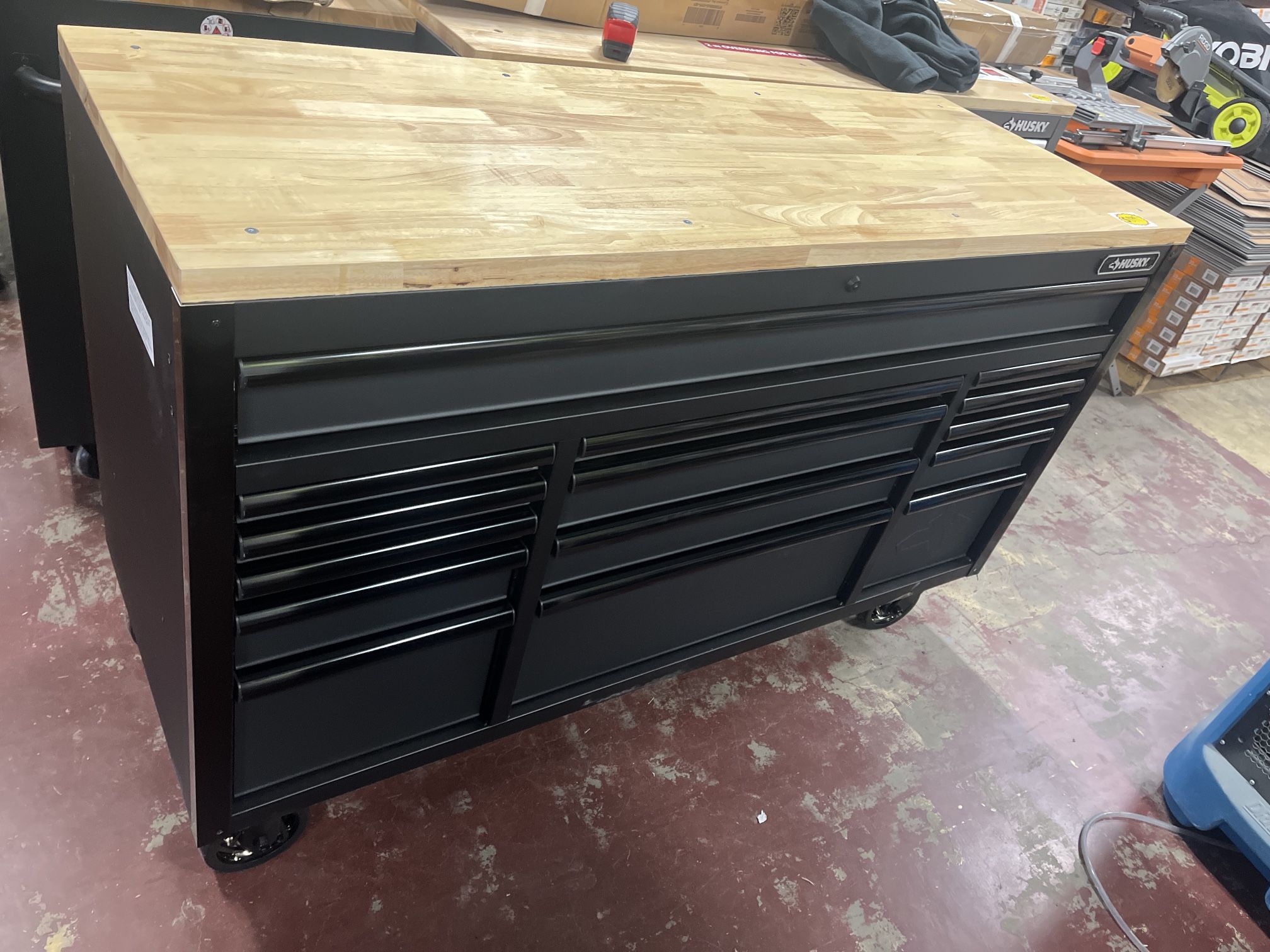 Husky 61 in. W x 23 in. D Heavy Duty 15-Drawer Mobile Workbench Tool Chest with Solid Wood Top in Matte Black