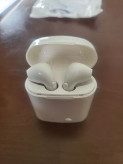 Bluetooth earbuds with charging case.