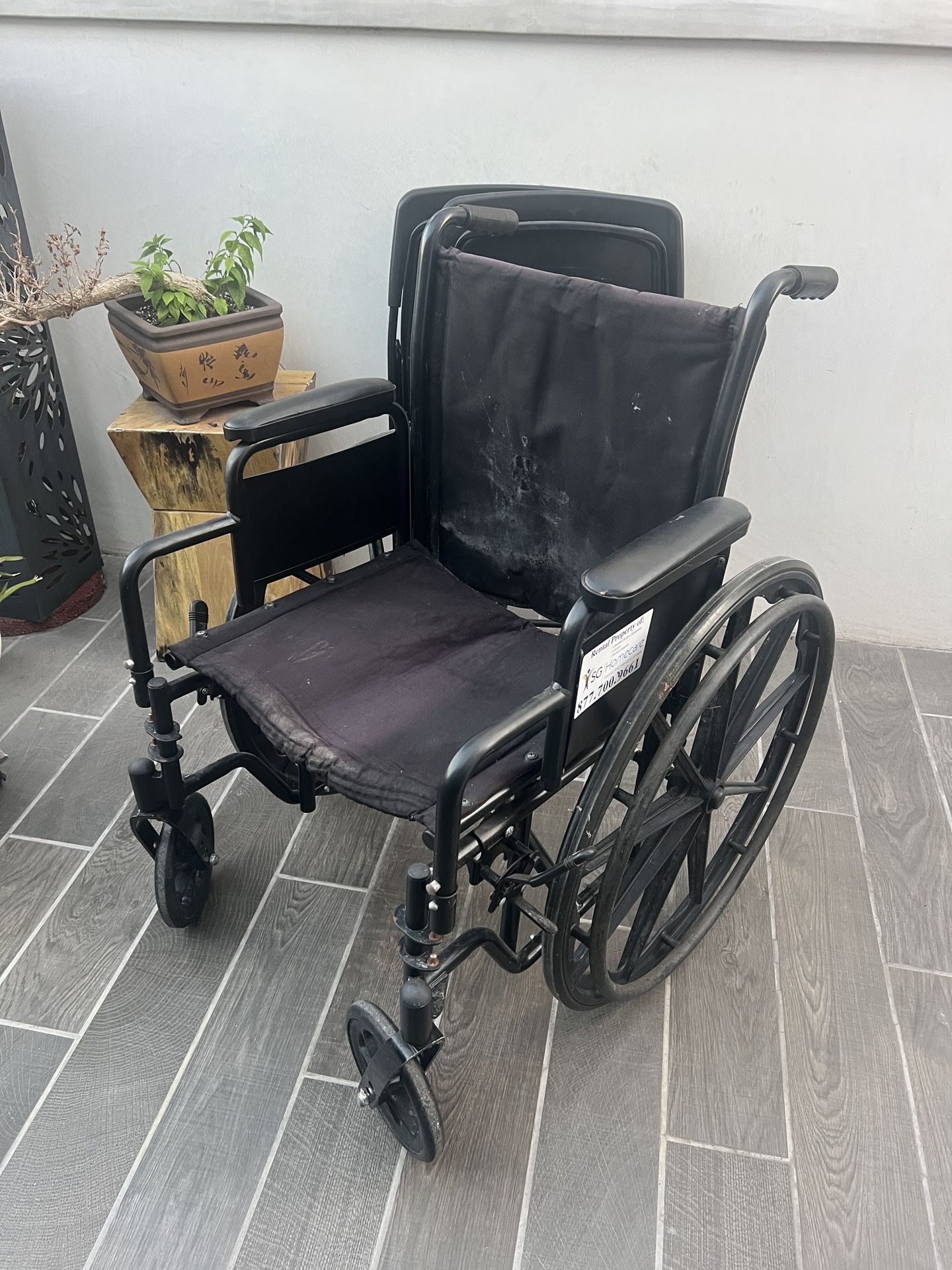 standard black manual wheelchair