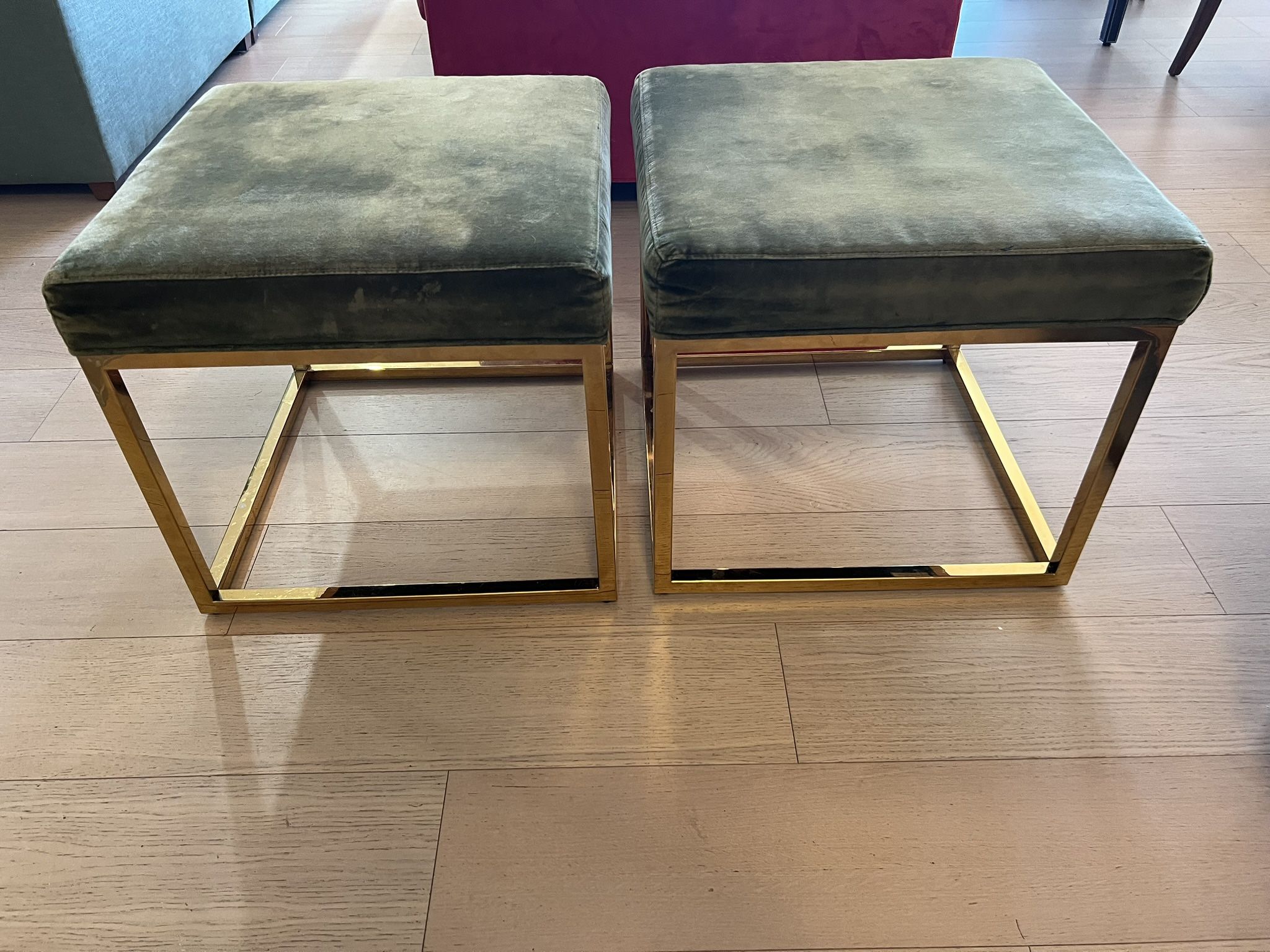 Pair of ottomans in green velvet with gold metal base Great condition Purchased from Perigold Modway Anticipate stool. Green velvet gold base 20” squa