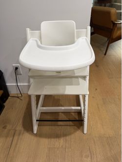 White Stokke trip trapp high chair