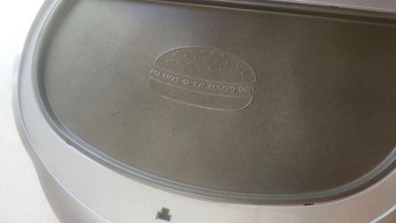 Hamburger cooking machine