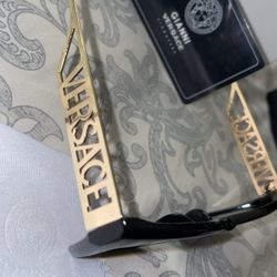 Used pair of versace sunglasses