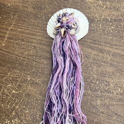 Wall, Decor, Shells, And Purple Yarn