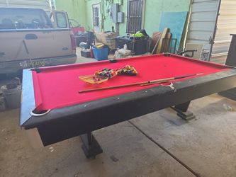 Pool table  good condition to play