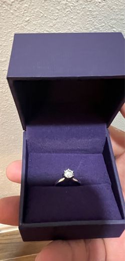 Gold ring with papers value $2300