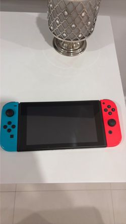 Nintendo switch with all cables and  some games included with additional accessories