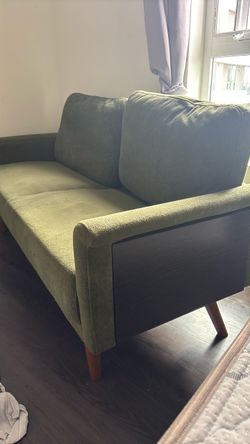 Green Armchair with Wooden Legs and side tables