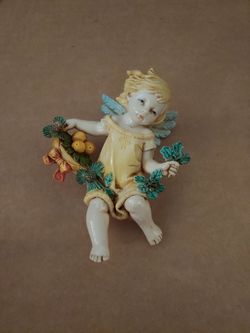 Cherub Angel Figurine with Holly and Fruit Basket