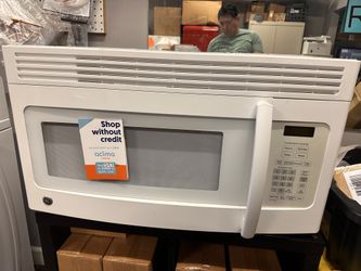 GE WHITE OVER THE RANGE MICROWAVE 