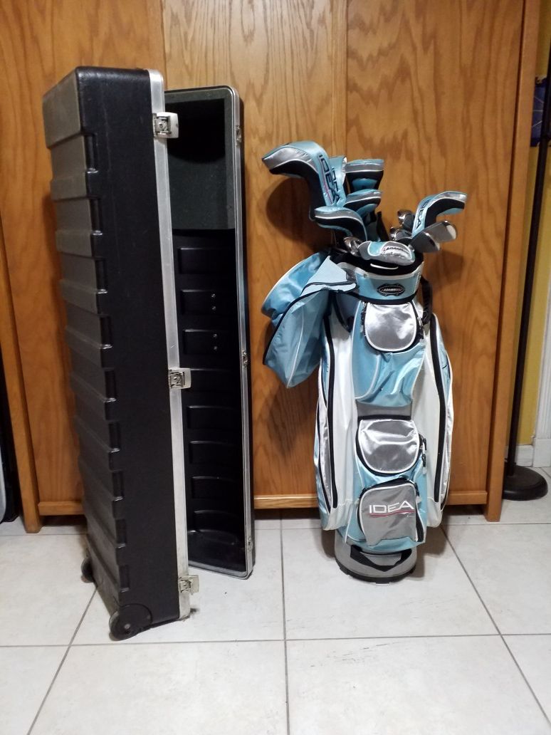 Adam's Womens Golf Set woods, irons, wedges, putter, head covers, bag and hard shell travel case. Buyer to pickup.