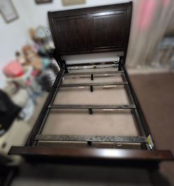 4yrs old wooden queen sleigh bed with frame and foot board