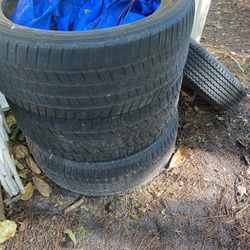 3 Truck Tires & 1 Trailer Tire 