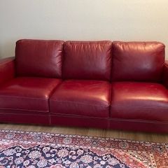 Red Leather Sofa Bed – Comfortable & Stylish!