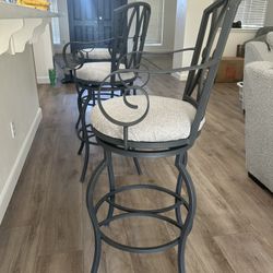 3 Swiveling Bar Stools