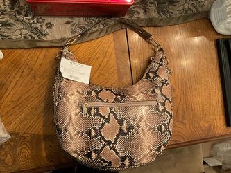 Snakeskin purse from Macys. Never used