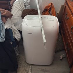 Toshiba portable air conditioner with hose that goes through the window as well as the window attachment. Like no, we used it once while our e our air