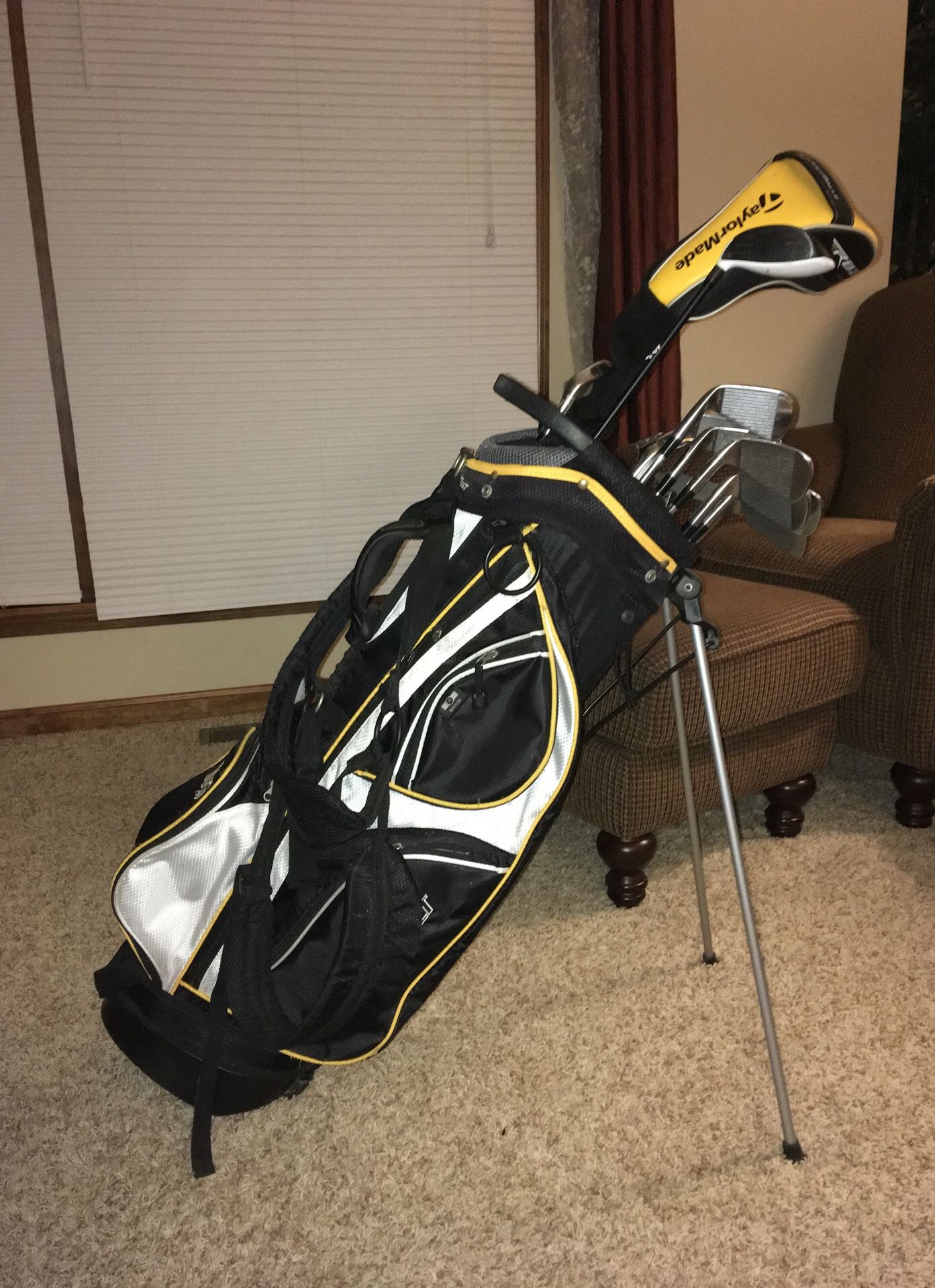 TaylorMade golf club set. Includes pitching wedge, sand wedge, 49 irons, rbz driver, rbz 3