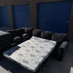 Ashley’s Dark Grey Sectional Couch With Bed 
