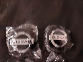 New Nissan center wheel hub cap