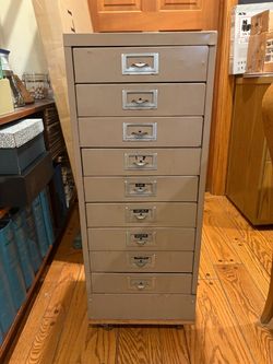 9 drawer, vertical cabinet on wheels