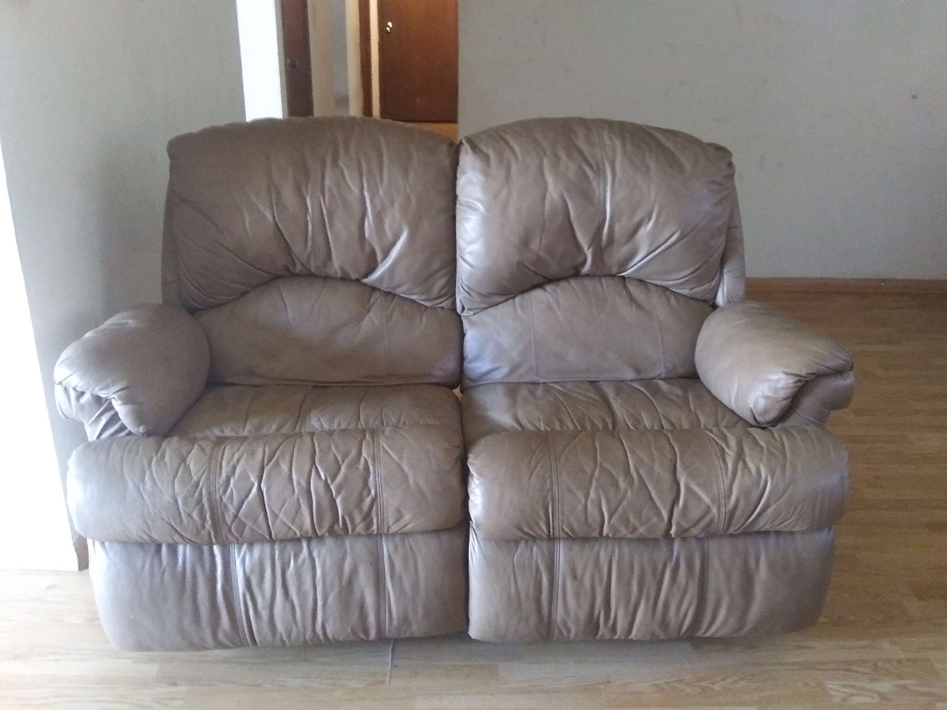 Perfect condition light brown Leather rocker recliner