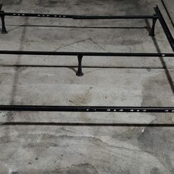 Metal bed frame. Adjustable up to Queen size.