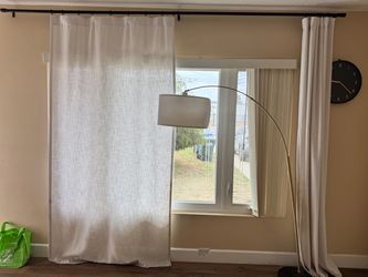 Black curtain rod and linen-like curtains