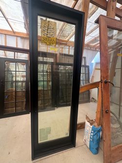 Black aluminum clad glass doors. Each $1195 -32x96